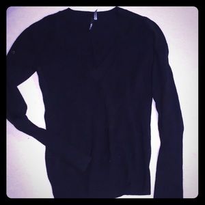 M black sweater